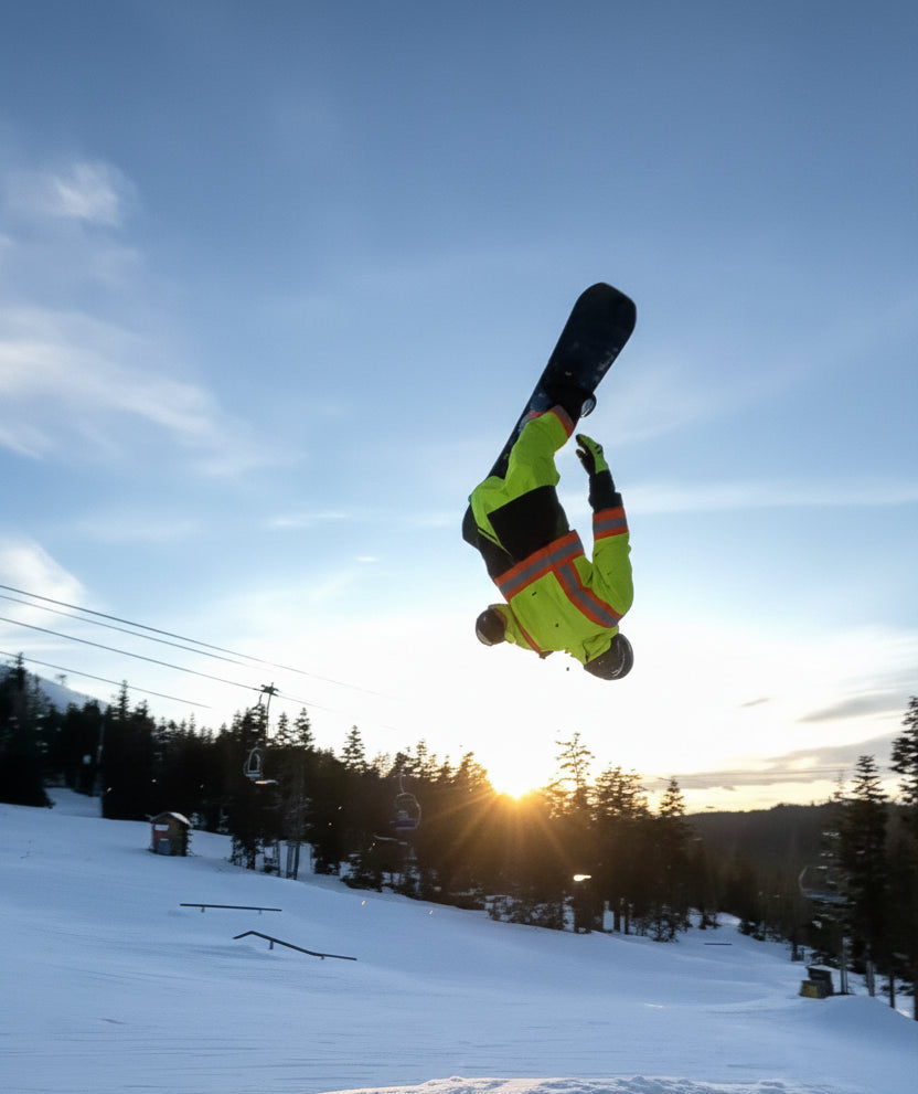 MHDUB team rider Nikko Kimbaugh, backflip at sunset, snowboard park