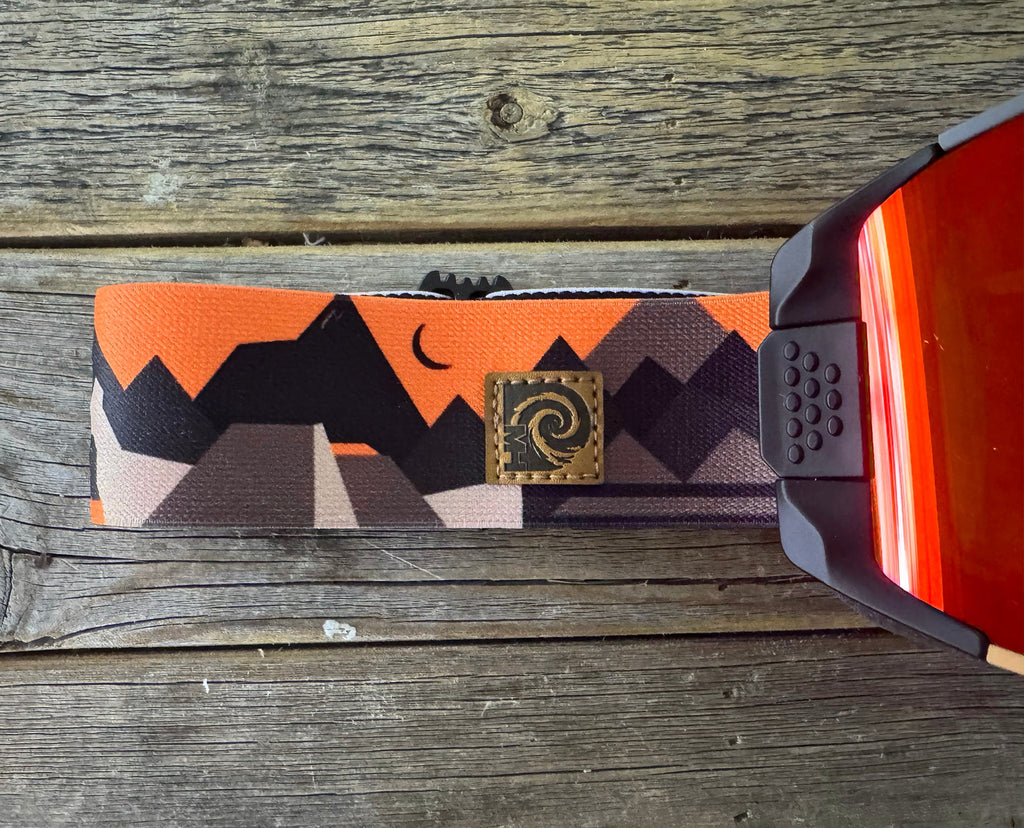 MHDUB logo patch on the Backcountry Pro Tech mountain print strap, Orange mirror lens 