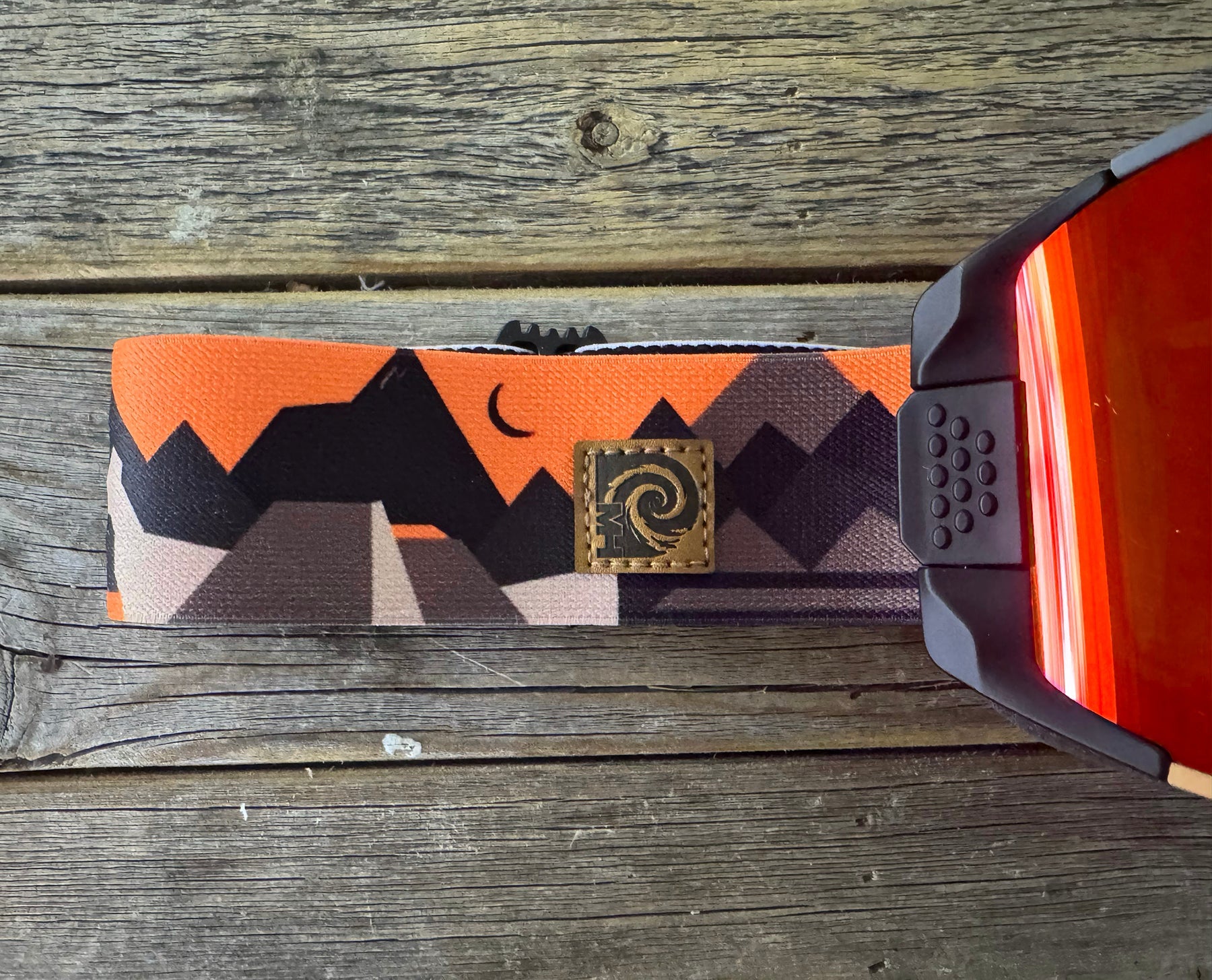 MHDUB logo patch on the Backcountry Pro Tech mountain print strap, Orange mirror lens 